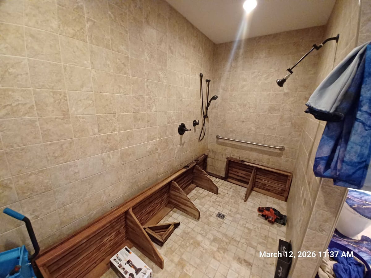 Accessible shower bench under repair
